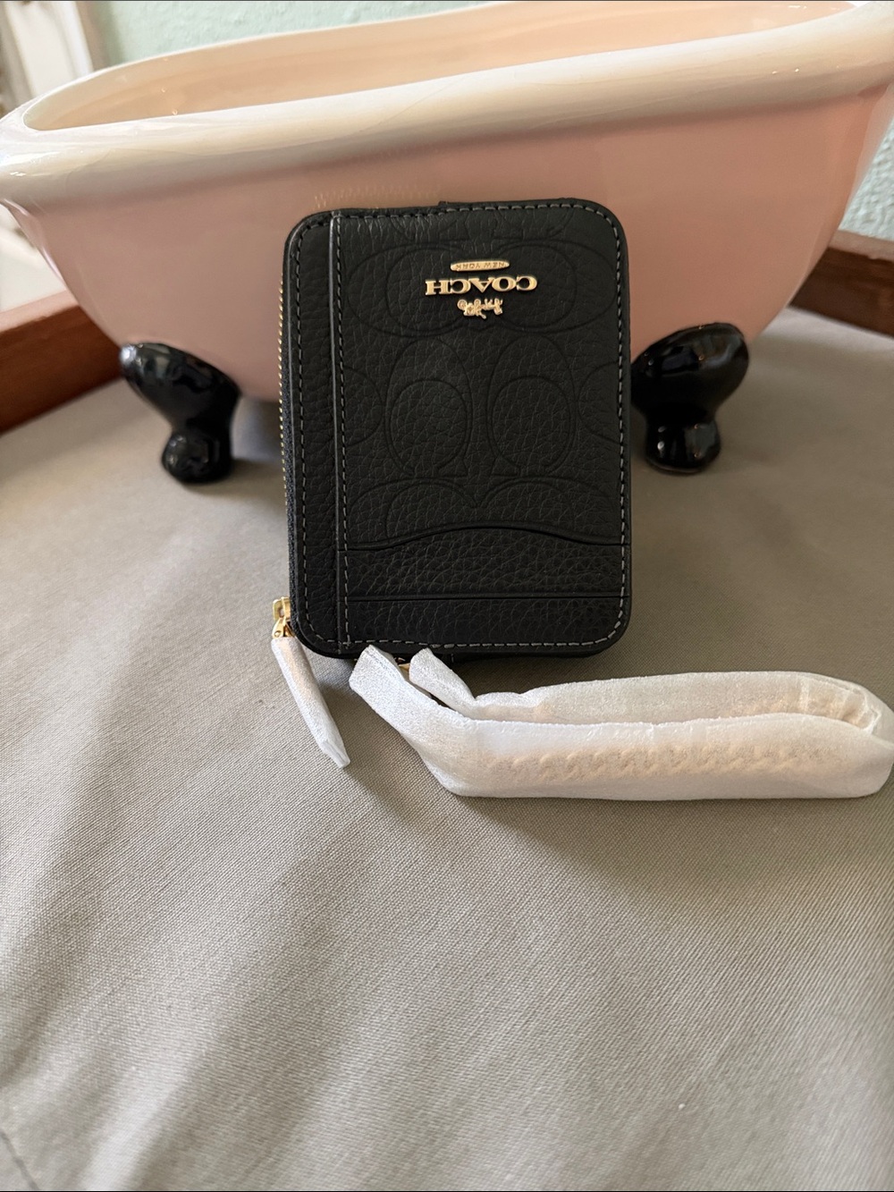 Coach Black Pebbled Leather Zip Card Case with Gold Logo